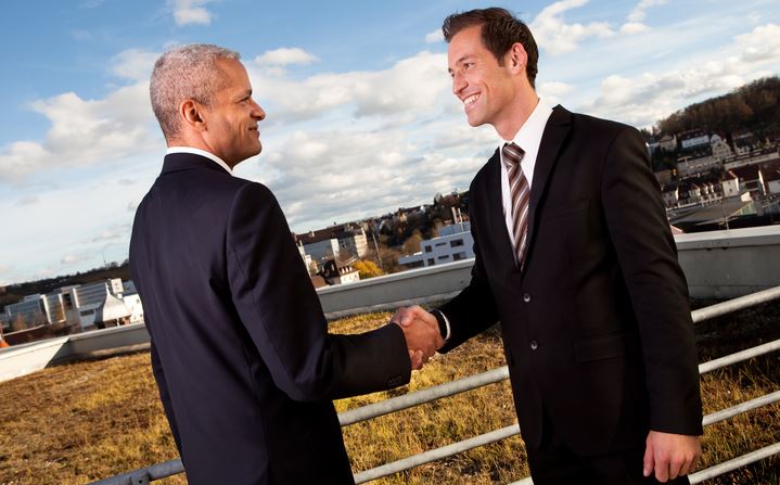 Business Professionals Shaking Hands